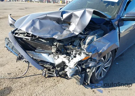 2020 Honda Insight Touring из США, поврежденный, VIN 19XZE4F91LE006584